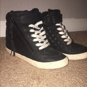 Black high top sneakers